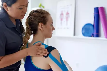 A physical therapist evaluates her client