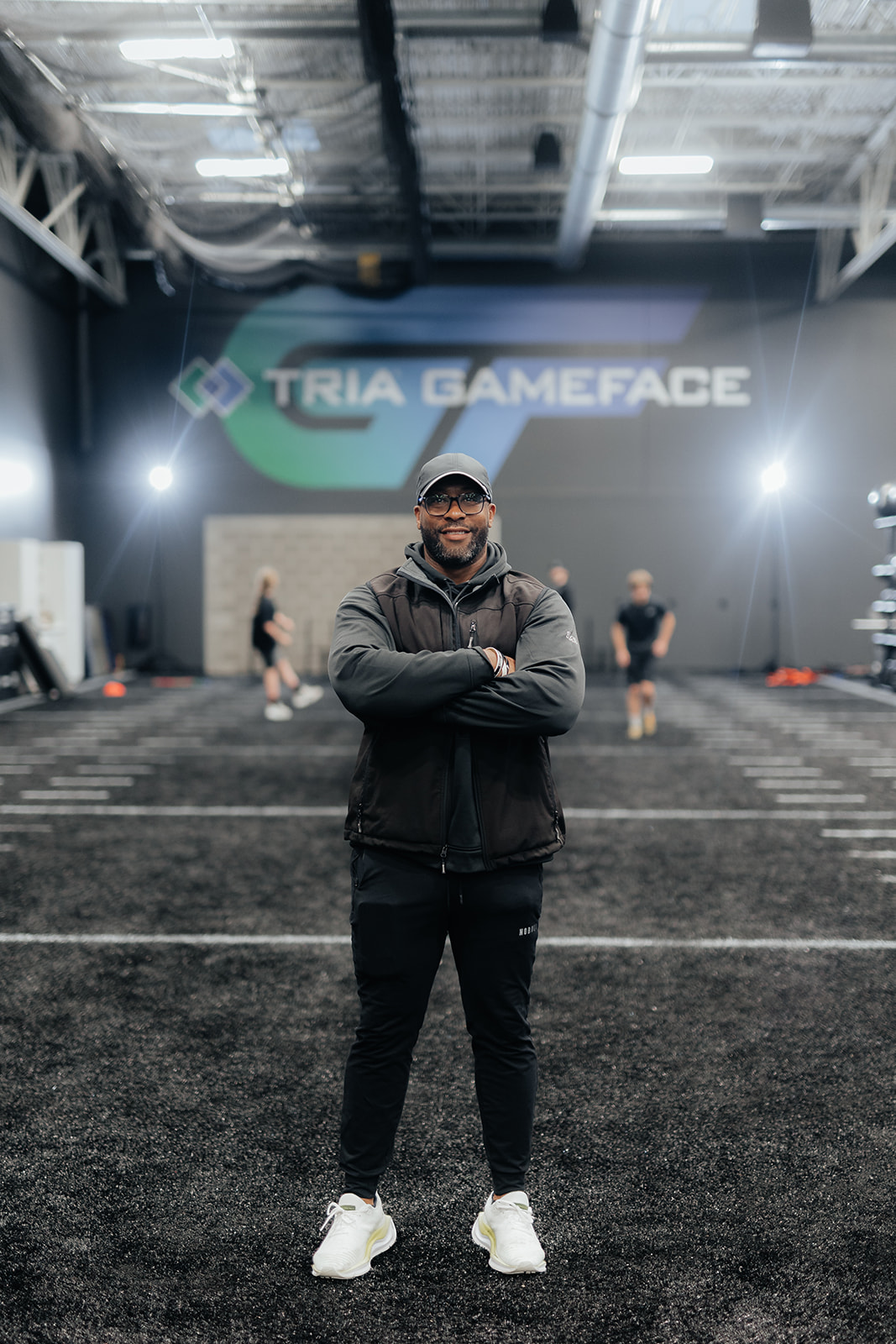 TRIA GameFace founder, DeVentri Jordan smiling at his training facility in St. Louis Park, MN